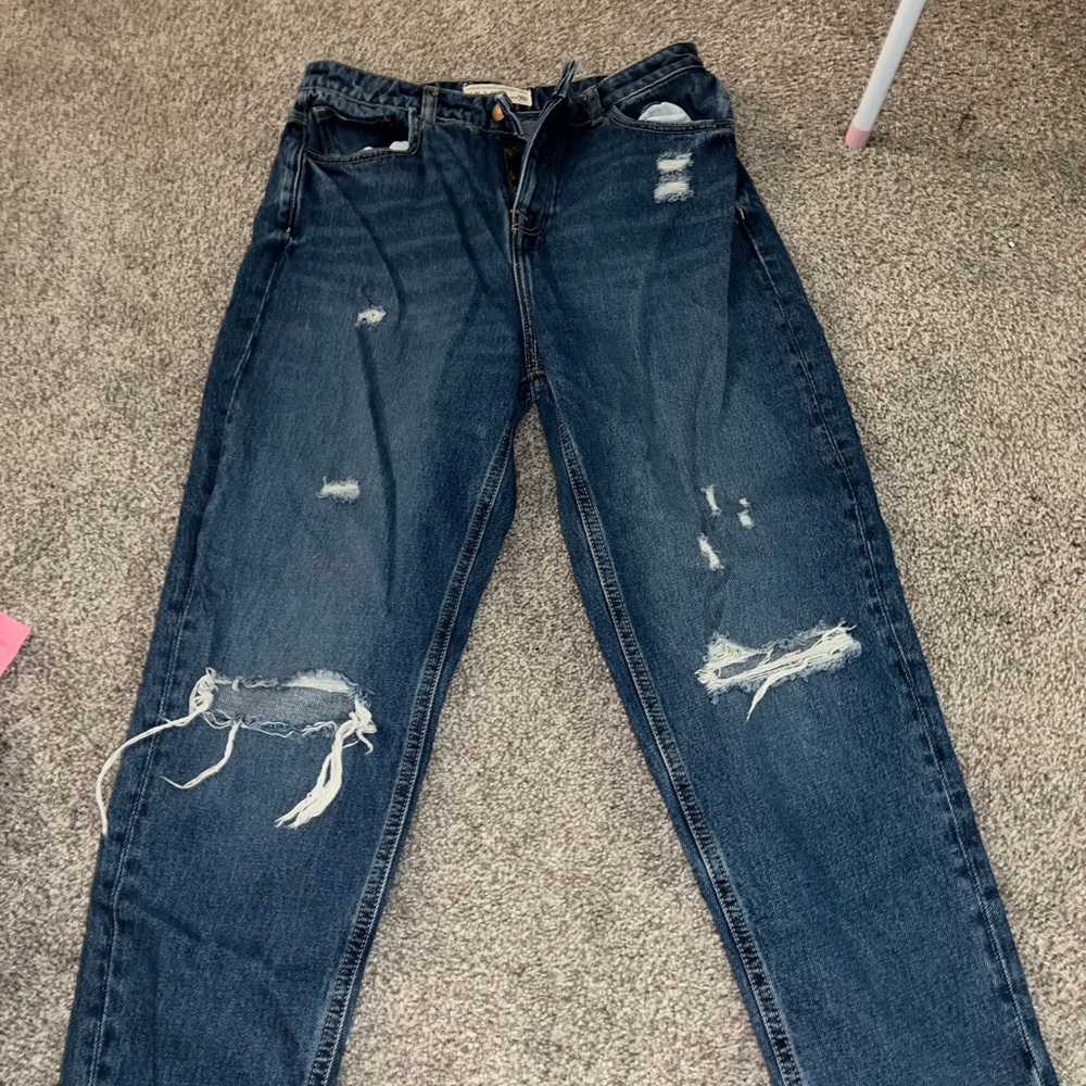 Distressed Blue Denim Jeans
